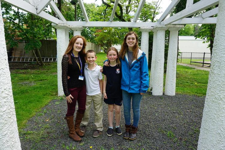 GCS Alumni and their siblings at Greenwich Catholic School on campus